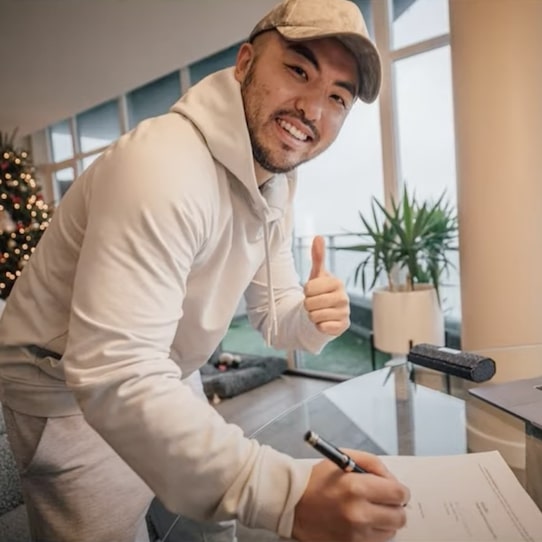 Tom Wang Signs Big Deal